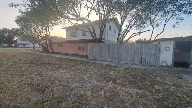 view of property exterior at dusk