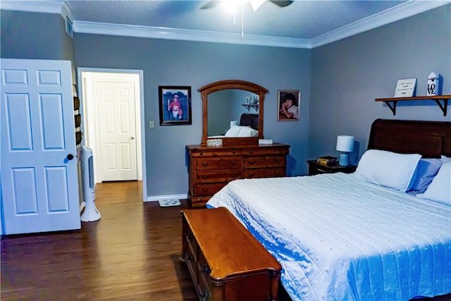 bedroom with a ceiling fan, baseboards, visible vents, dark wood-type flooring, and crown molding