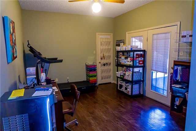 office area featuring wood finished floors, a ceiling fan, a wealth of natural light, and a textured ceiling