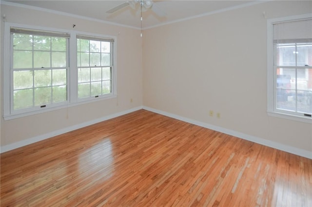 613 Brawner Pkwy, Corpus Christi, TX 78411 - empty room featuring light wood-type flooring, baseboards, ceiling fan, and ornamental molding