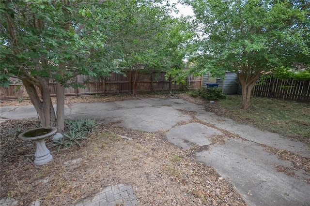 613 Brawner Pkwy, Corpus Christi, TX 78411 - fenced backyard with a patio