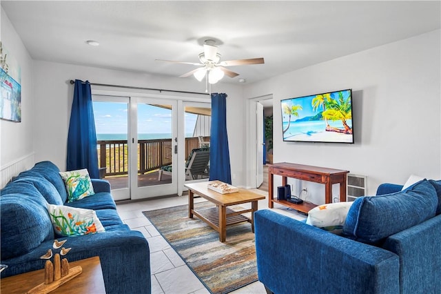 5973 State Highway 361 Unit 332, Port Aransas, TX 78373 - living room featuring ceiling fan and light tile patterned floors