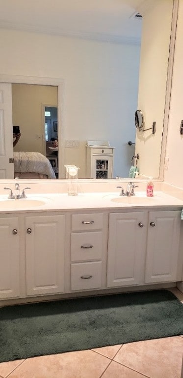 bathroom with vanity and tile patterned floors