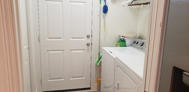 laundry area with washer and clothes dryer