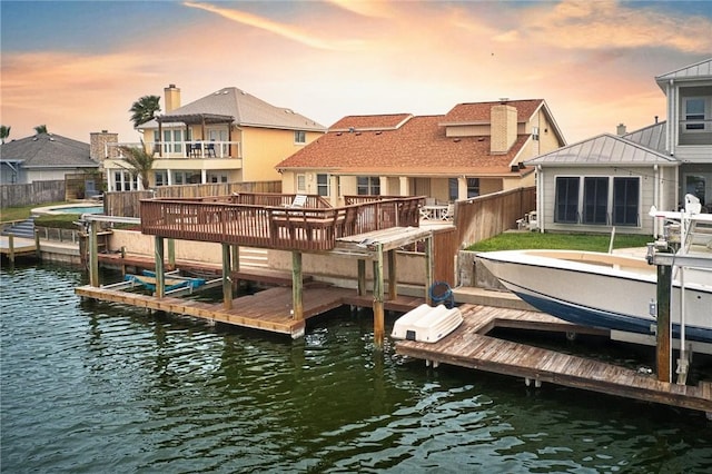 15849 El Soccorro, Corpus Christi, TX 78418 - dock area featuring a water view, fence, and boat lift