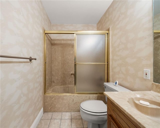 15849 El Soccorro, Corpus Christi, TX 78418 - bathroom featuring toilet, tile patterned floors, enclosed tub / shower combo, and vanity