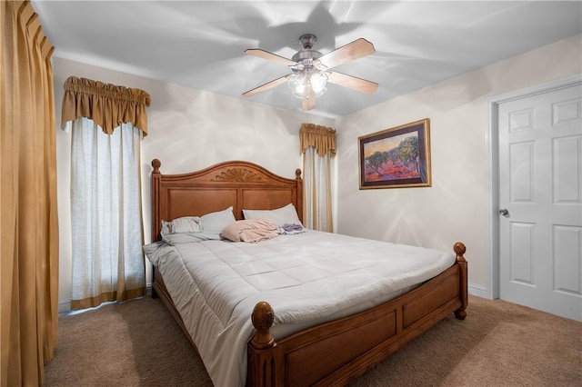 15849 El Soccorro, Corpus Christi, TX 78418 - carpeted bedroom with baseboards and ceiling fan
