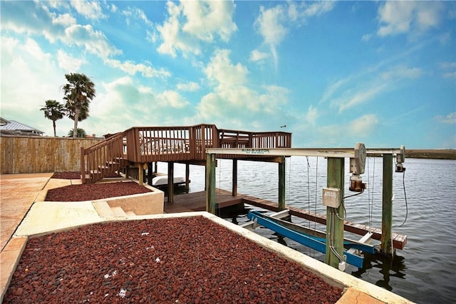 15849 El Soccorro, Corpus Christi, TX 78418 - dock area with a water view and boat lift