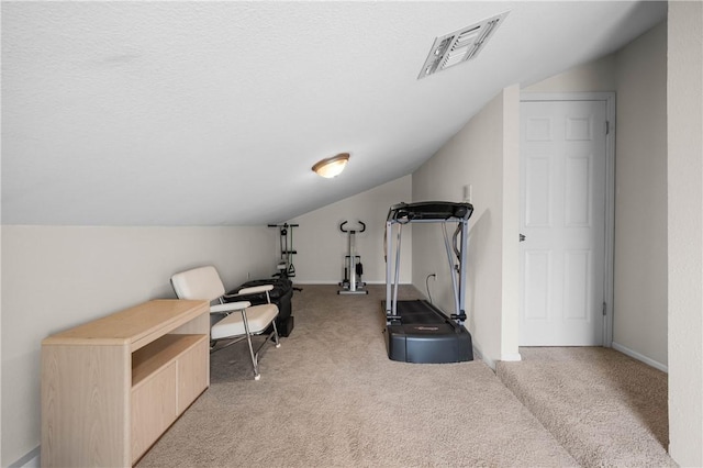 15849 El Soccorro, Corpus Christi, TX 78418 - exercise room with baseboards, lofted ceiling, light colored carpet, and visible vents