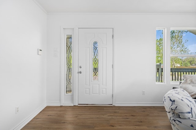 1179 Houston St S, Aransas Pass, TX 78336 - entryway with wood finished floors and crown molding
