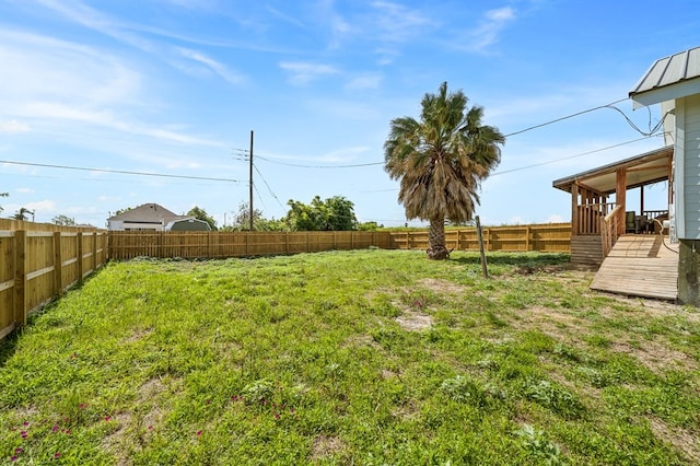 view of yard featuring a deck