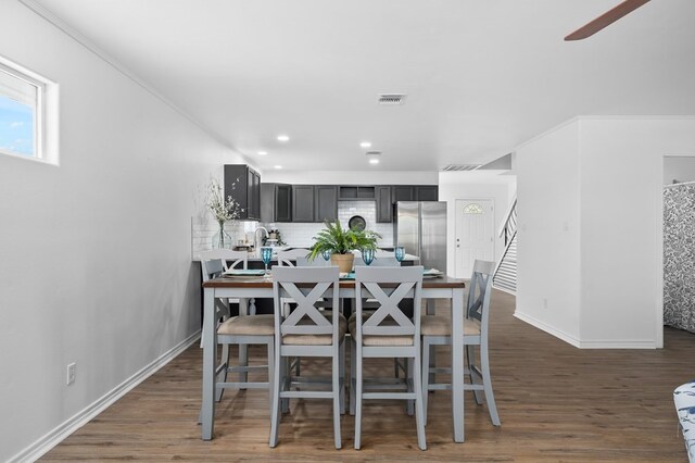 1179 Houston St S, Aransas Pass, TX 78336 - dining space featuring wood finished floors, a ceiling fan, and recessed lighting