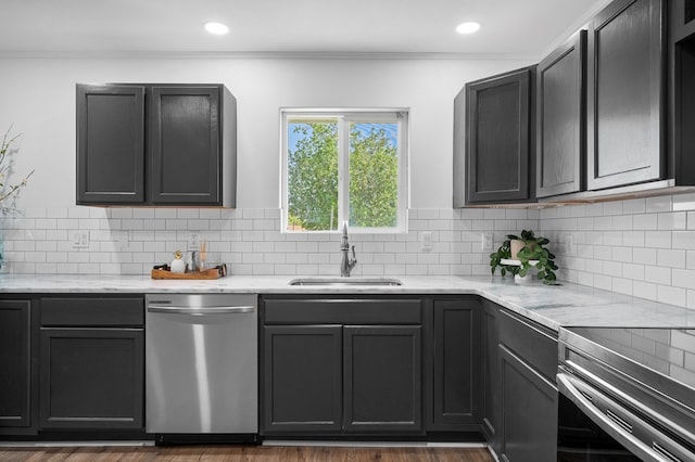 1179 Houston St S, Aransas Pass, TX 78336 - kitchen with dishwasher, light stone countertops, tasteful backsplash, dark wood finished floors, and ornamental molding