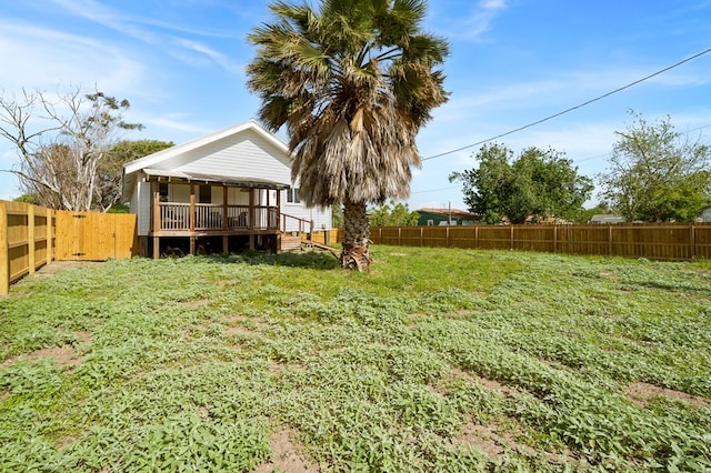 1179 Houston St S, Aransas Pass, TX 78336 - fenced backyard with covered porch and a gate