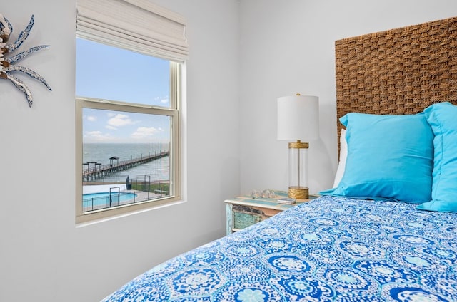 bedroom with a water view