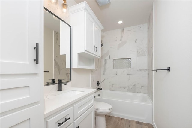 3618 Perry, Corpus Christi, TX 78410 - bathroom featuring toilet, vanity, shower / washtub combination, wood finished floors, and recessed lighting