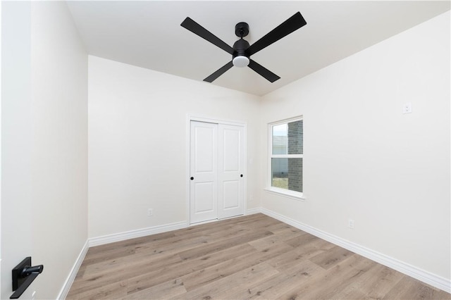 3618 Perry, Corpus Christi, TX 78410 - spare room with light wood-style floors, ceiling fan, and baseboards