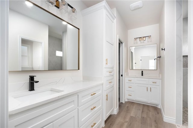 3618 Perry, Corpus Christi, TX 78410 - full bathroom featuring wood finished floors and vanity