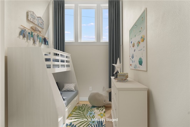 bedroom featuring hardwood / wood-style flooring