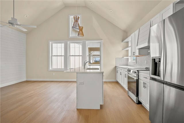 kitchen featuring white cabinetry, a wealth of natural light, and stainless steel appliances