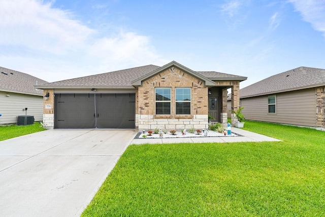 7753 Lariat Toss Dr, Corpus Christi, TX 78414 - view of front facade with brick siding, a garage, a front lawn, and driveway