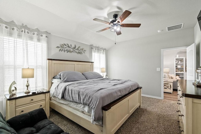 7753 Lariat Toss Dr, Corpus Christi, TX 78414 - bedroom with light colored carpet, baseboards, vaulted ceiling, and ceiling fan