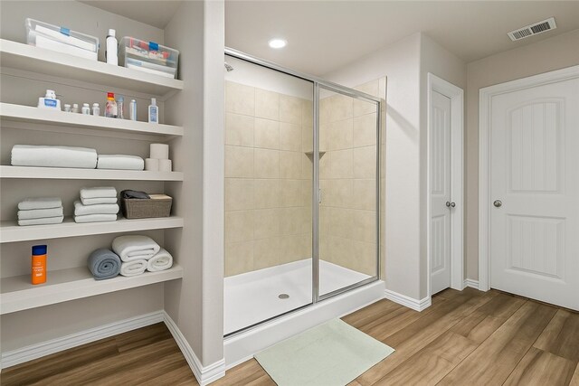 7753 Lariat Toss Dr, Corpus Christi, TX 78414 - full bath with a shower stall, wood finished floors, baseboards, and recessed lighting