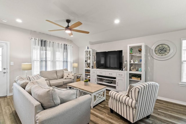 7753 Lariat Toss Dr, Corpus Christi, TX 78414 - living area with a ceiling fan, dark wood-style flooring, healthy amount of natural light, lofted ceiling, and recessed lighting