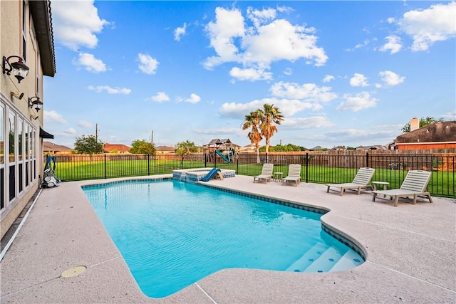 5514 King Trl, Corpus Christi, TX 78414 - view of swimming pool featuring a patio, a playground, and a pool with connected hot tub