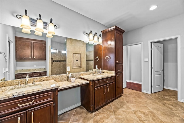 5514 King Trl, Corpus Christi, TX 78414 - full bath featuring two vanities, walk in shower, and baseboards