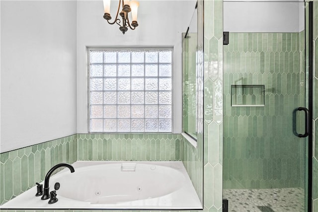 5514 King Trl, Corpus Christi, TX 78414 - full bath featuring a stall shower, a whirlpool tub, and a chandelier