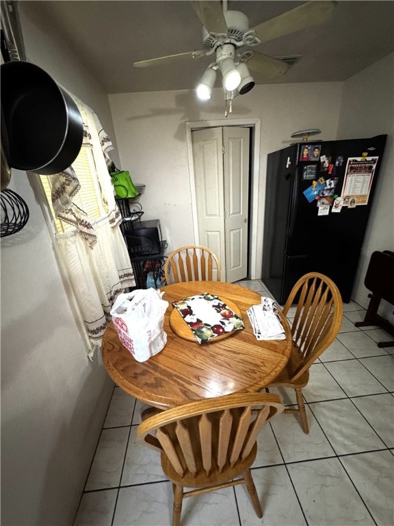 dining space featuring a ceiling fan