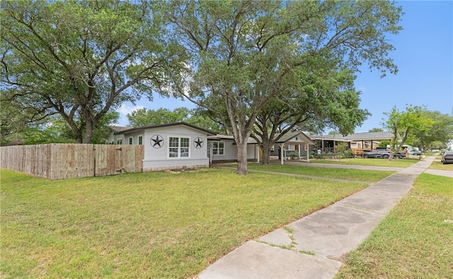 620 E 9th St, Bishop, TX 78343 - view of front facade with fence and a front yard