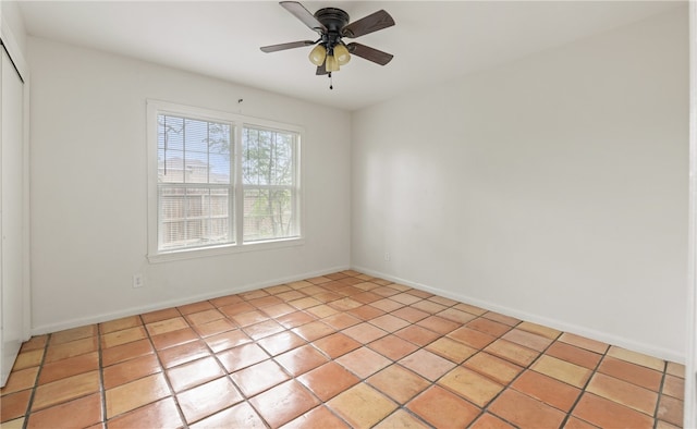 620 E 9th St, Bishop, TX 78343 - spare room with baseboards, a ceiling fan, and light tile patterned floors