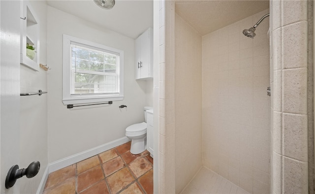 620 E 9th St, Bishop, TX 78343 - bathroom with a stall shower, toilet, and baseboards