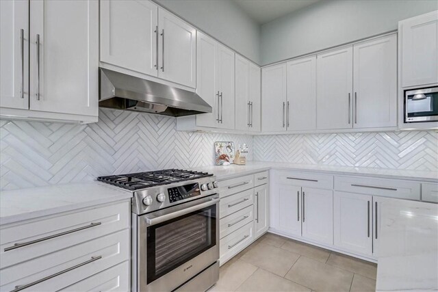 dining space with light tile patterned floors and sink