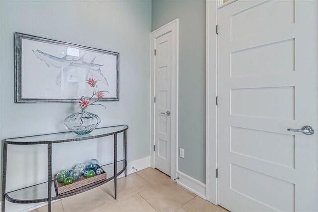 foyer with light tile patterned floors