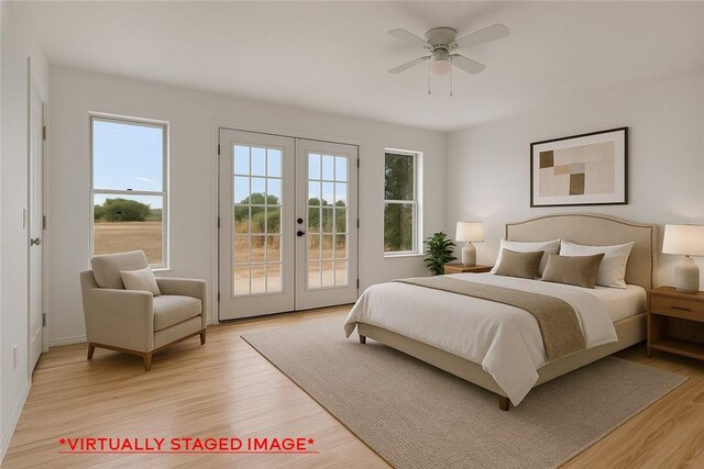 5367 Paloma Trl, Robstown, TX 78380 - bedroom with french doors, access to exterior, light wood-type flooring, and baseboards