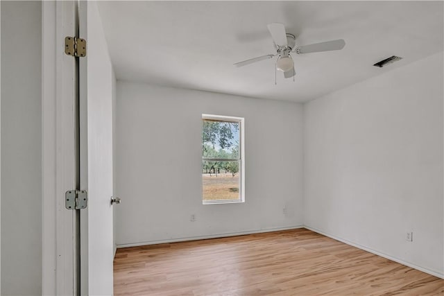 5367 Paloma Trl, Robstown, TX 78380 - unfurnished room featuring wood finished floors, ceiling fan, and baseboards