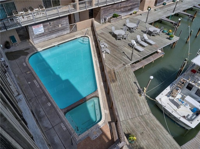 view of pool featuring a pool with connected hot tub