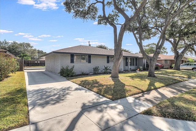 ranch-style house with a front lawn