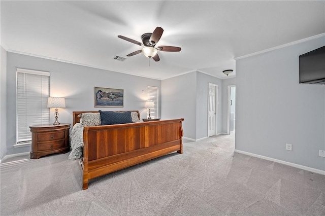 bedroom with light carpet, crown molding, and ceiling fan