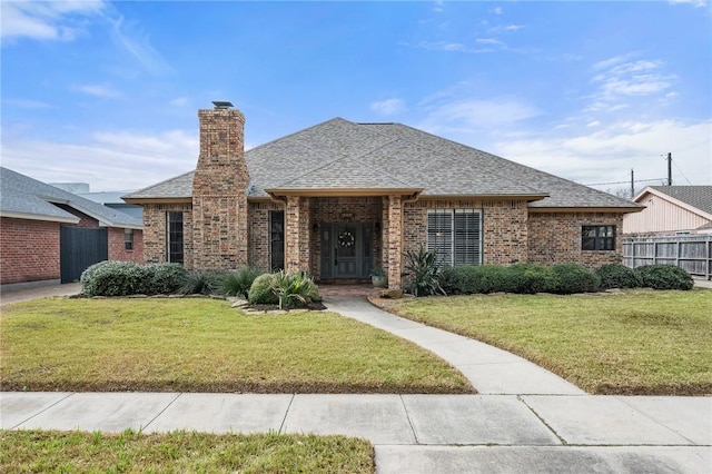 view of front of property with a front lawn