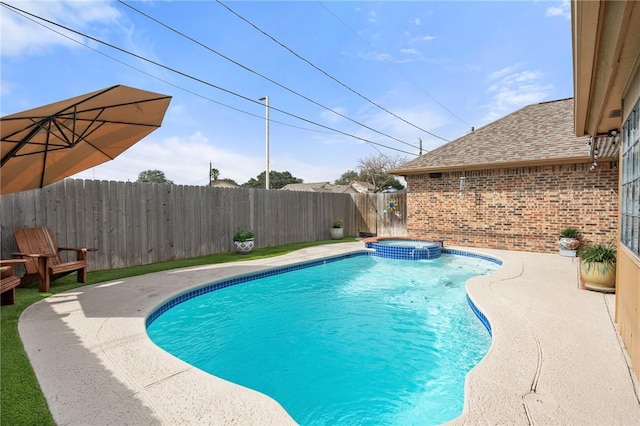 view of swimming pool featuring a patio and an in ground hot tub