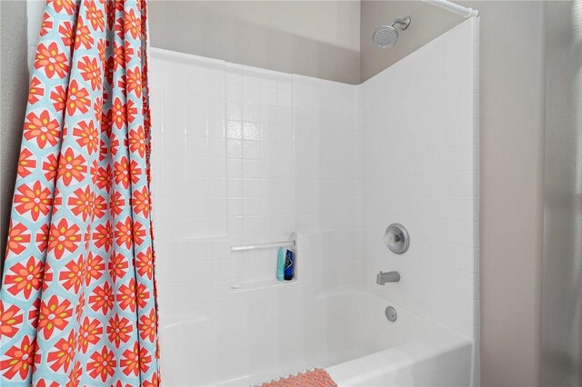 139 Heron Oaks St, Rockport, TX 78382 - full bathroom featuring shower / bathtub combination with curtain