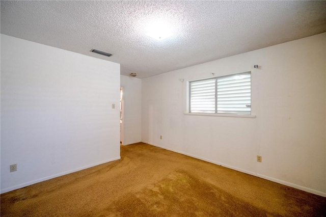 1601 Spicewood Dr, Corpus Christi, TX 78412 - carpeted spare room featuring a textured ceiling and baseboards