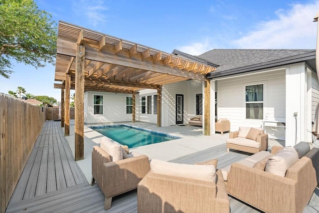 back of property with a pergola, a fenced in pool, a fenced backyard, an outdoor living space, and a patio