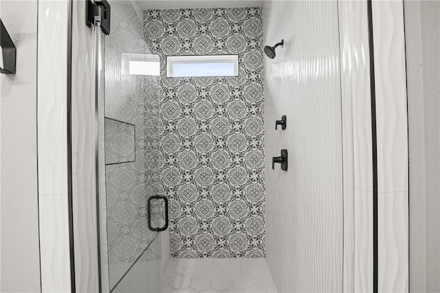 bathroom with a stall shower