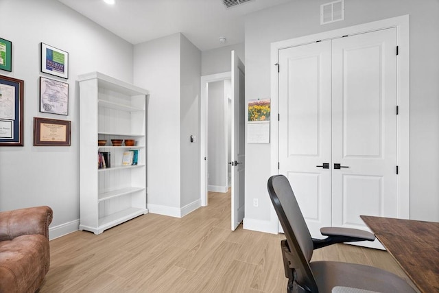 office area featuring visible vents, recessed lighting, baseboards, and light wood-style floors