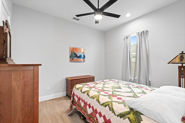 bedroom featuring visible vents, baseboards, ceiling fan, recessed lighting, and light wood finished floors